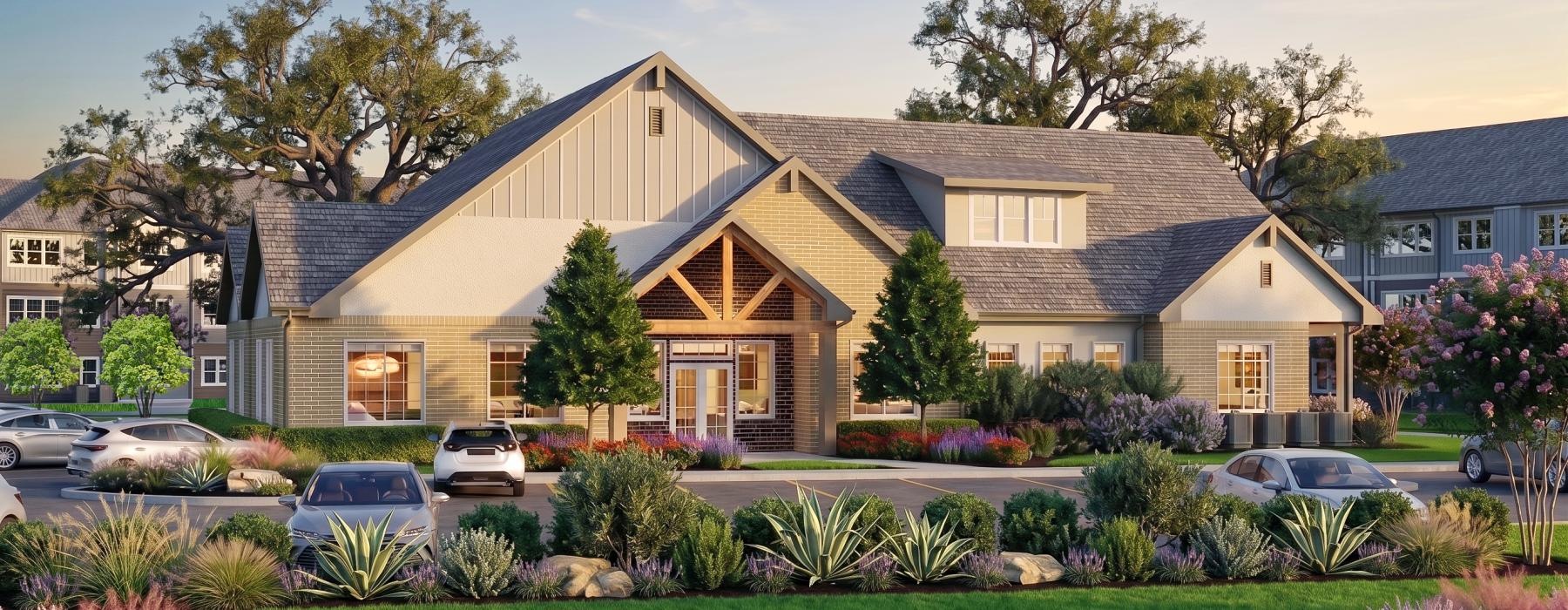 a building with a lawn and cars in the front